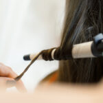 hairstylist-curling-hair-client-in-hairdressing-sa-2025-02-25-21-43-05-utc_Easy-Resize.com